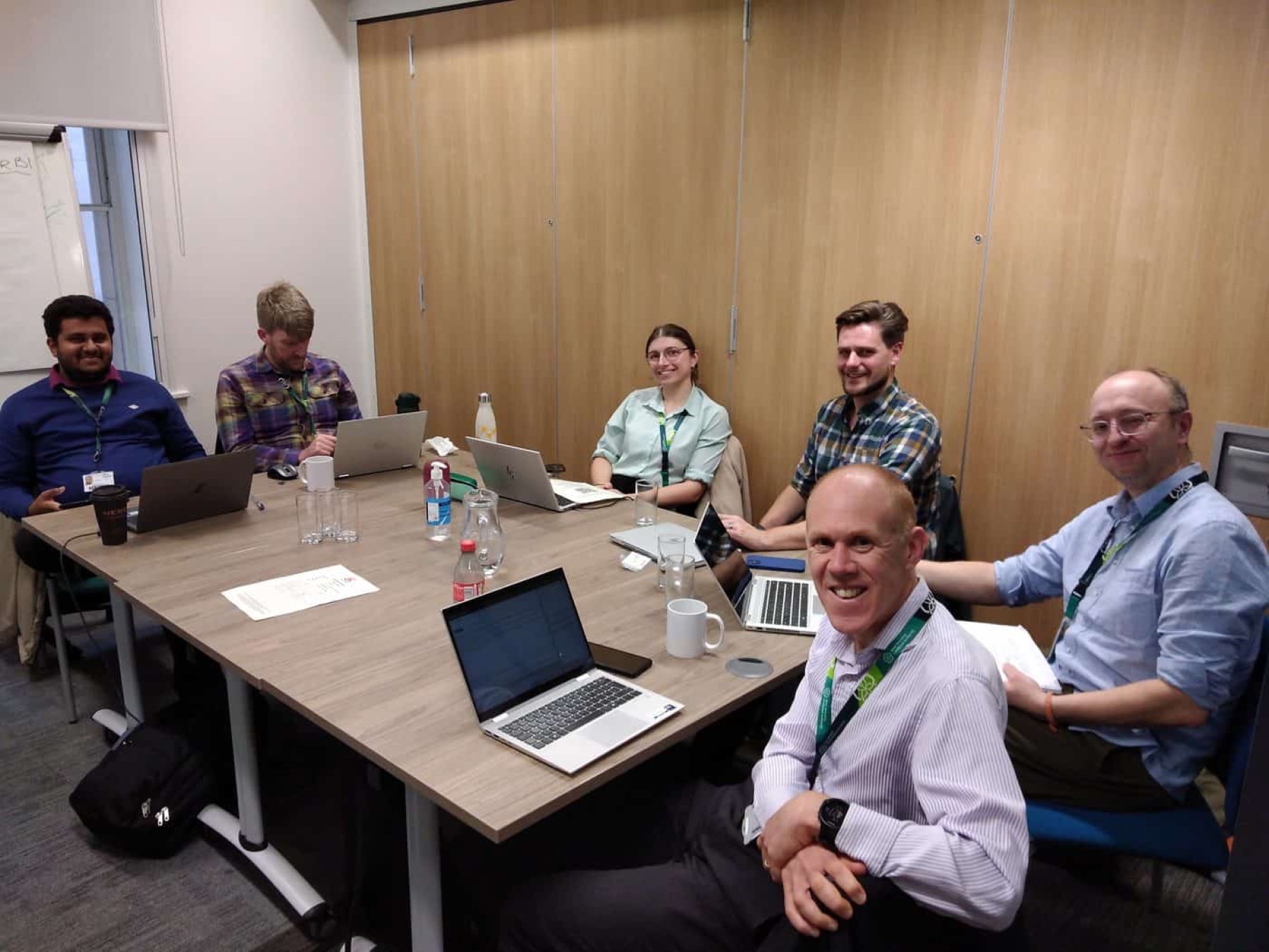 An in-house management training group with their trainer