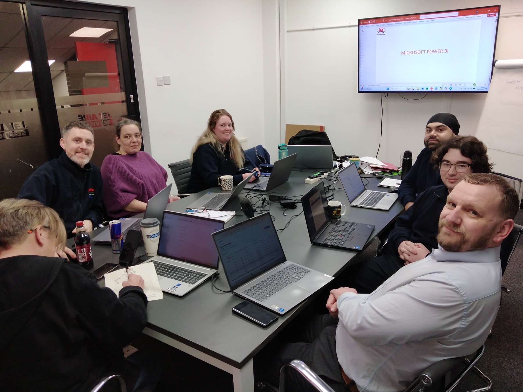 A team on a Microsoft Power BI training course